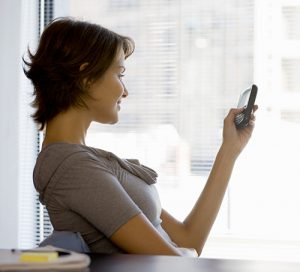 woman looking at phone