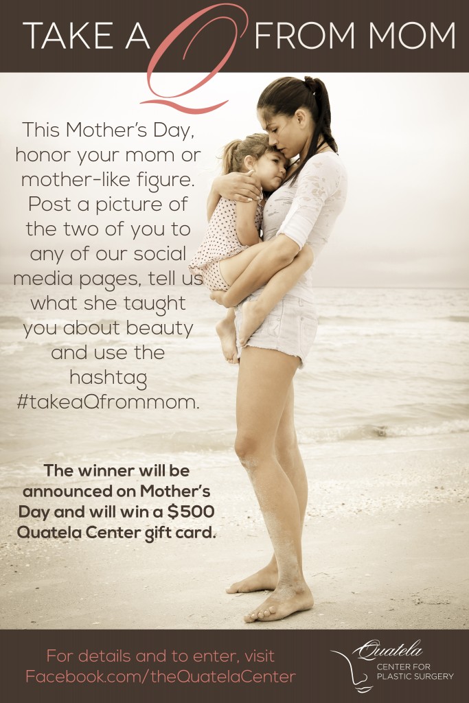 Mother standing on beach with pre-teen daughter in arms