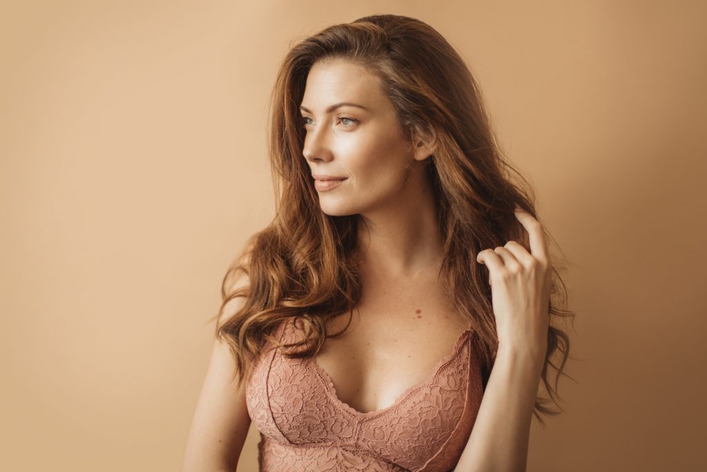 Close-up portrait of a beautiful young woman. Woman in lingerie.