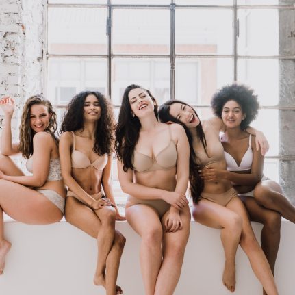 Group of diverse women smiling and laughing