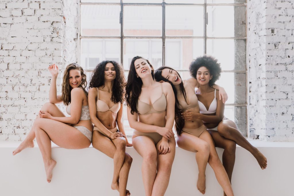 Group of diverse women smiling and laughing