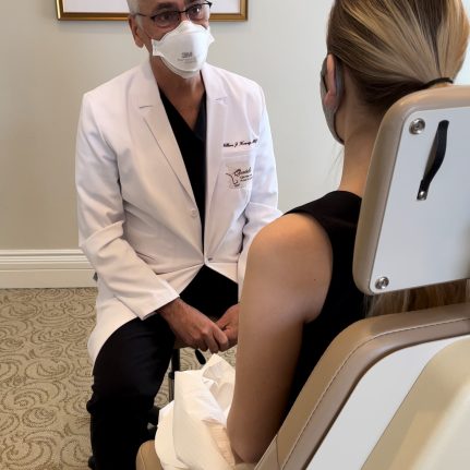 Dr. Koenig talking to female patient