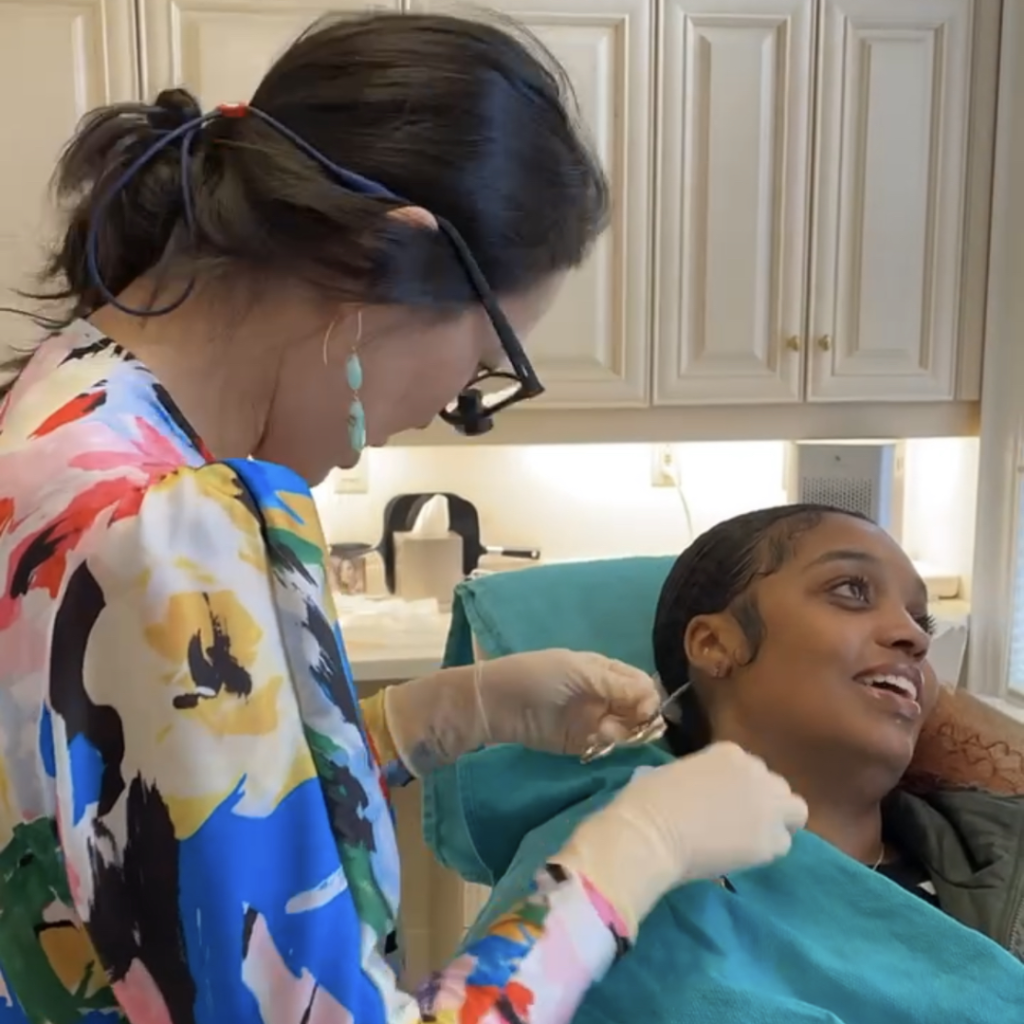 Dr. Lee performing an earlobe repair